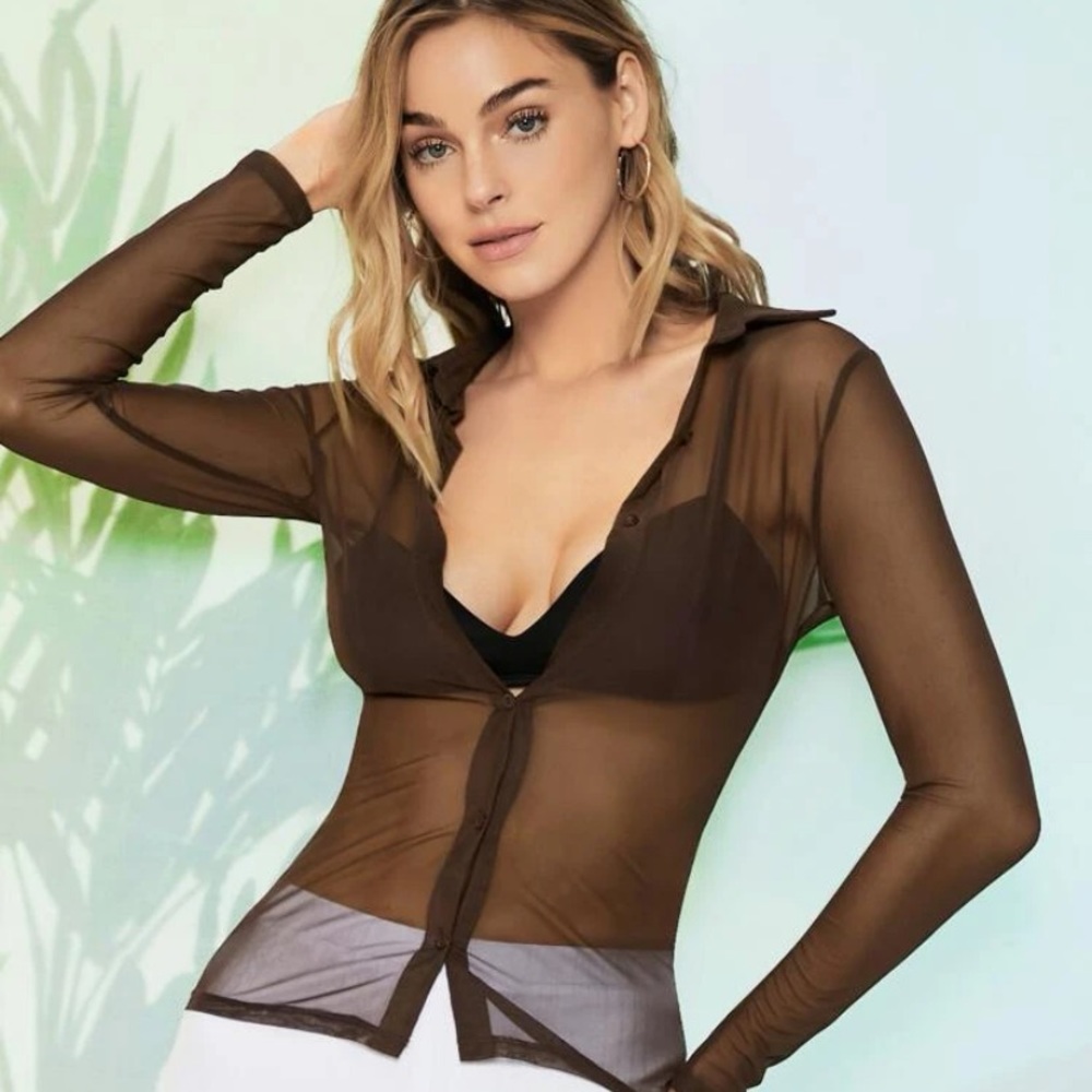 Sheer mesh blouse without bra.